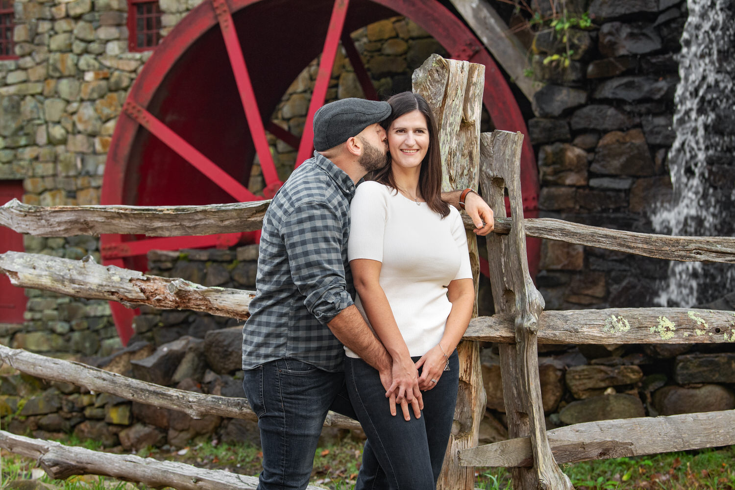 Featured image for how to pose for engagement photos, featuring a couple posing.
